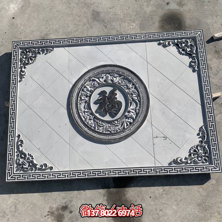 黃色沙巖浮雕影壁，景觀背景雕塑