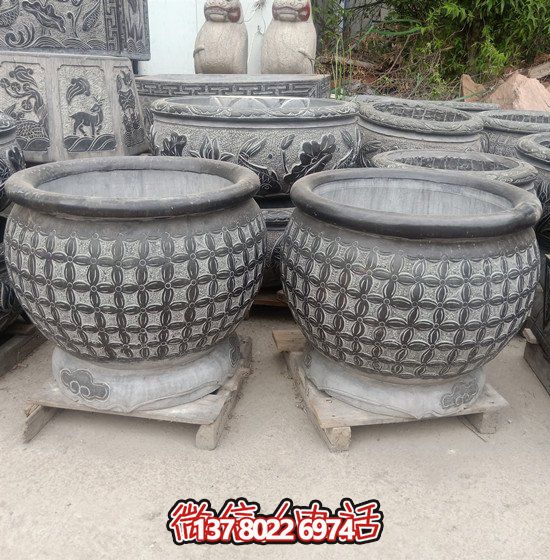 自然美學(xué)結(jié)合青石石雕、浮雕、編織、雕塑的戶外園林魚缸